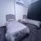 Dinar apartments - twin bed - 阿布扎比