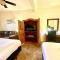 Lake view queen guest room with two queens, sleeper sofa and patio overlooking Lake Ouachita, Hotel Room