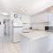 Sandy Straits Poolside Escape with Beach Access