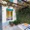 Casa delle Vigne: Giardino, pergola e vista lago