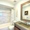 Two story condo with ocean on one side and bay on other only steps away