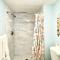 Two story condo with ocean on one side and bay on other only steps away - برادنتون بيتش