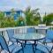 Two story condo with ocean on one side and bay on other only steps away - برادنتون بيتش