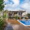 The Navigator with heated pool and spa