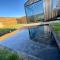 Glass roof lodge with private hot tub - Reykholt