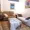 Apartamento con pequeño jardín en el centro