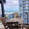 Top floor apartment by the beach