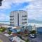 Top floor apartment by the beach