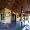 StayVista at Riverfront Cottage with Scenic River view, BBQ, Bonfire, Gazebo, Pet friendly