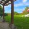 Apartamento La Ermita con jardín - Suances