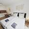 TiCasa BOHO - Zentral-Outlet-Balkon-Parkplatz-SmartTV-Unique