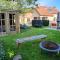 7 person House with garden, firepit, swimming lake, hammock, child friendly, in- and outside playground, slide, and great coffee - Ewijk