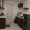 SnugglePod Condotel - Grand Riviera Suites