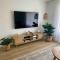 Modern Beach home with large private gardens Modern Beach home with large private gardens