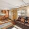 Silverglo Condominiums Unit 202, Upgraded Condo with Wood-Burning Fireplace and Access to a Pool
