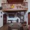 Casa Rosa de Peruíbe - Casa de Temporada 3 dormitórios, 10 hóspedes, piscina, wi-fi, netflix, 800 metros da praia