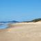 Sun, sand, and surf, Sunrise Beach