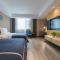 LanOu Hotel Wuxi Anzhen East High-Speed Railway Station