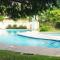 1br, 24hr security - City Charm with Poolside Peace - Port-of-Spain