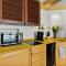 Cozy Queen Suite in European Village with Balcony view near beaches