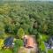 Spacious wooden cottage with infra-red sauna at Veluwe
