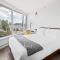 GardenView Modern Condo with Parking, Gym, Pool, AC