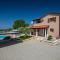 Activity villa Gita with pool and grill in Tinjan