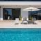 Modern villa Blanka with pool and grill in Tinjan