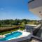 Modern villa Blanka with pool and grill in Tinjan