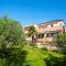 Seaside apartments with a swimming pool Njivice, Krk - 21421