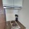 One Uptown in BGC Chic & Trendy 1BR 200mbps fiber - 马尼拉