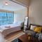 One Uptown in BGC Chic & Trendy 1BR 200mbps fiber - 马尼拉