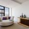 Modern meets Retro in Penthouse with Soaring Views - Melbourne