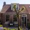 Atmospheric Wadden houses located next to each other near the Wadden Sea - Paesens