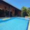Elegante com lareira, Piscina, Área Gourmet, Bilhar, Wi-Fi, SmartTV - Itanhaém