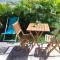 Chaleureuse maison au Moule avec piscine partagée