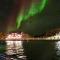 Modern waterfront rorbu with terrace and stunning sea view - free parking
