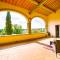 Farmhouse with swimming pool surrounded by greenery just 20 minutes from Arezzo