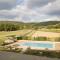 Farmhouse with swimming pool surrounded by greenery just 20 minutes from Arezzo