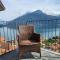 Amazing Lake View Apartment with Pool and 2 Terraces, Modern Urio, by STAYHERE-LAKECOMO