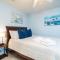 PALM COVE VACATION HOME- One level, Community pool, Pet Friendly