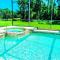Modern 5 Bed4.5 Bath PoolSpa Villa in Watersong - Loughman