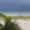 Tropical Beachfront Penthouse-Beach Cottages II