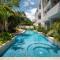 NHOA 101B Lux 1BR Condo Pool access in Aldea Zama - 图卢姆