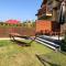Half of holiday home, terrace, playground