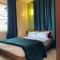 Cozy 1-Bed Apt with Pool & Gym in Najjera 2 - Kira