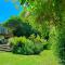 Secluded Villa with Lush Gardens, Spa and Fireplace