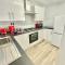 Central MK Home, Garden and Free Private Driveway Parking! 4 Beds Fully Equipped Train station 5 Mins