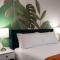 Your UF Getaway: 1 Block from Campus - 4 BD Haven