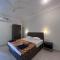 Morjim Sunset Guesthouse- Apartments with Kitchen & AC Rooms